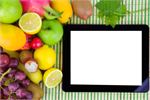 tablet and fruit